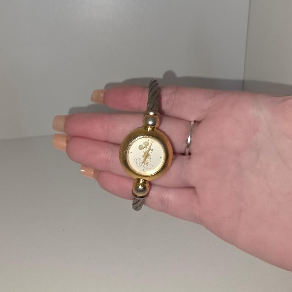 Vintage Disney Mickey Mouse gold watch with silver cable design